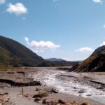 Flowing stream landscape symbolising emotional release and healing in counselling